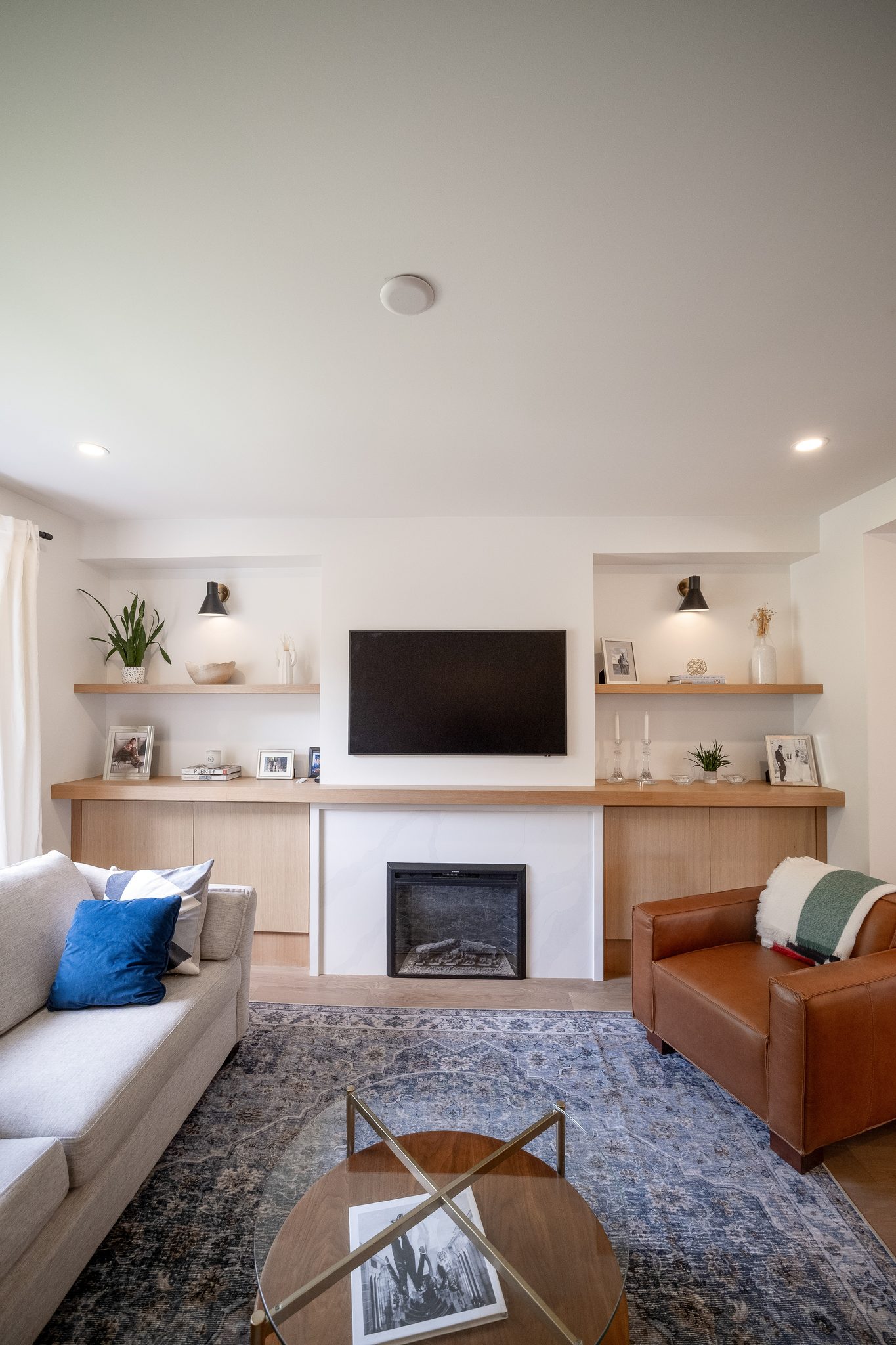 Living room with white oak built-ins, High Park renovation, Toronto
