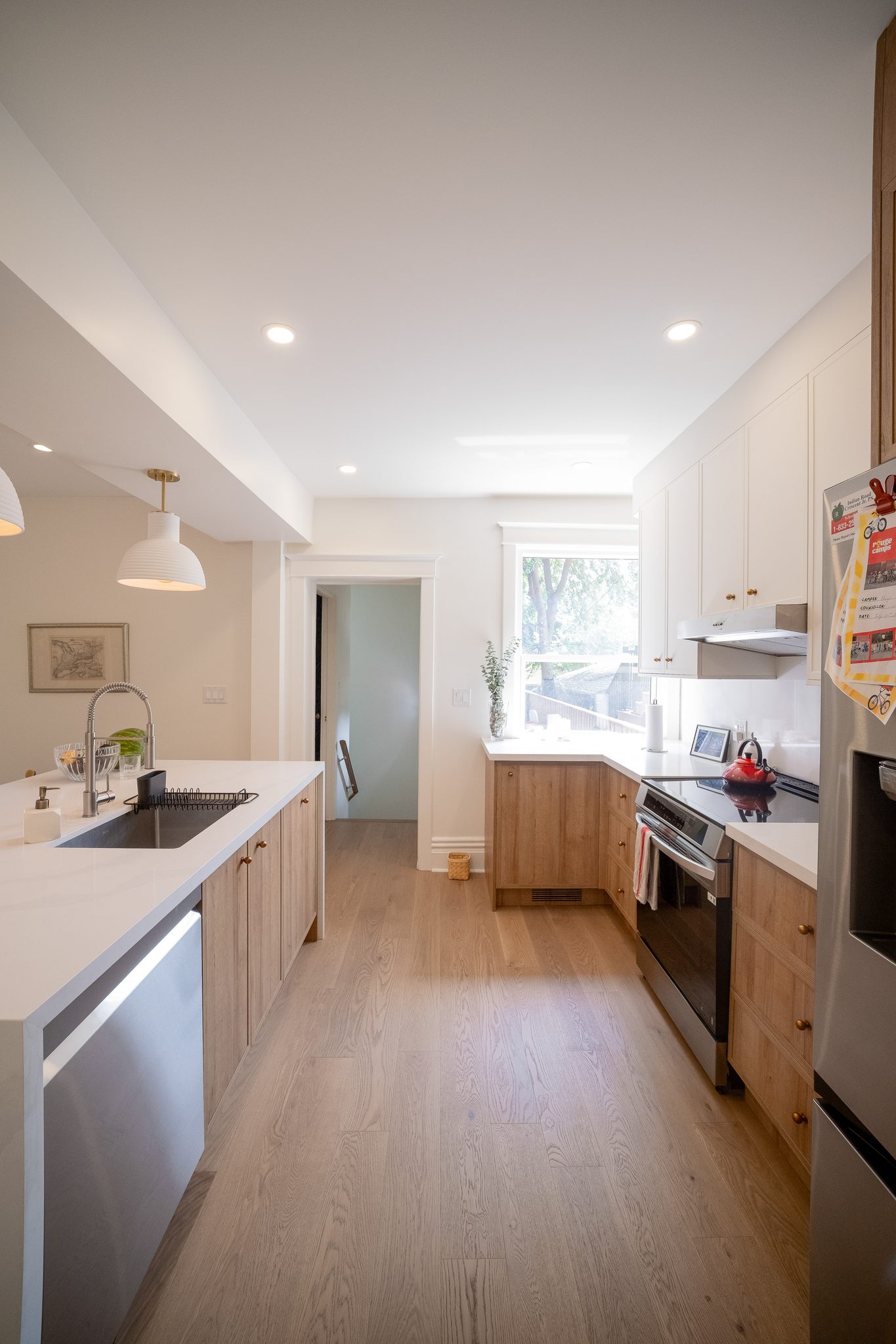 Renovated kitchen with white oak island, High Park, Toronto